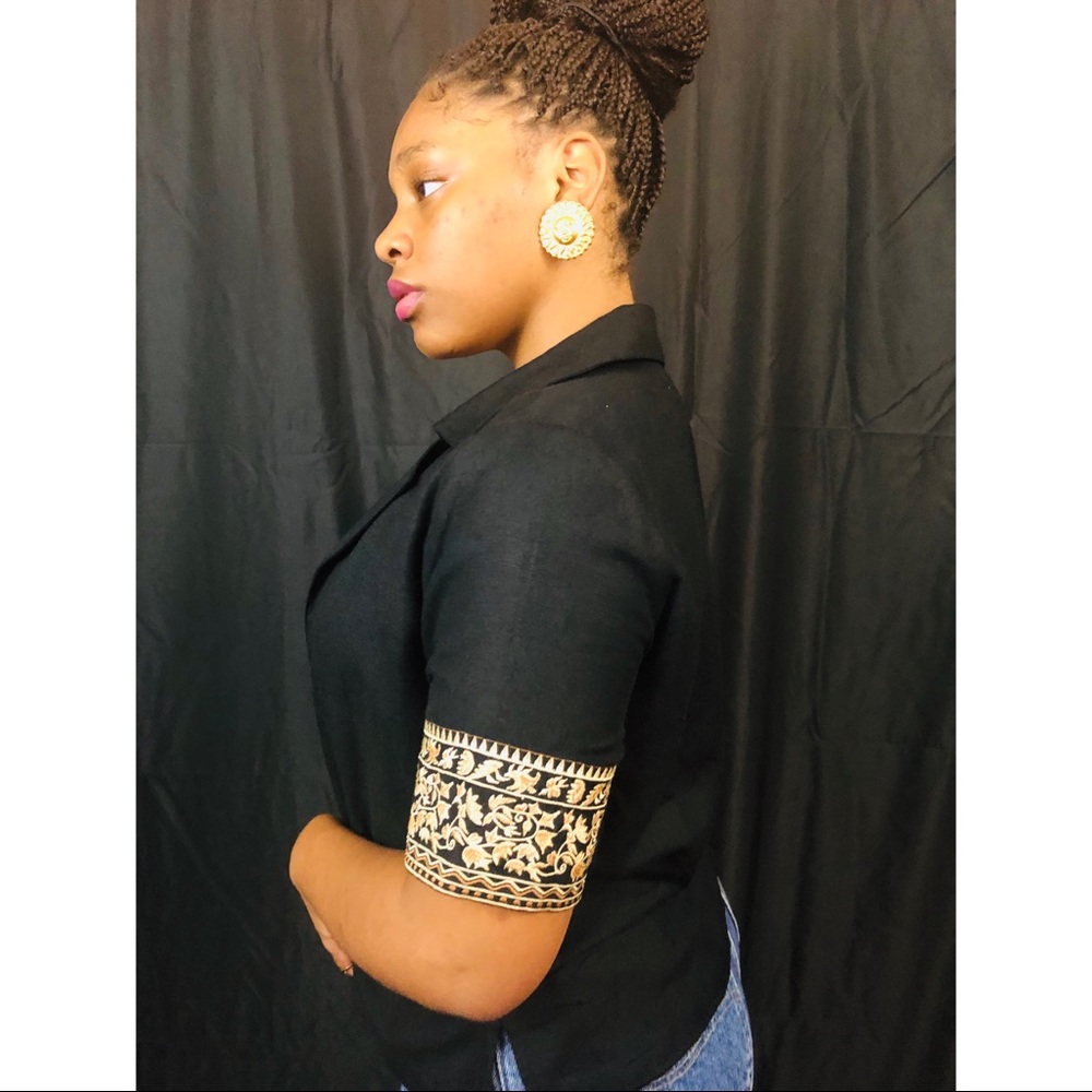 Open black top with printed sleeves